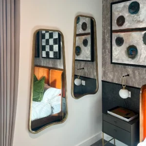 Two mirrors in bedroom