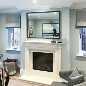 Mirror above fireplace